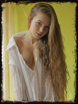 Milena D flips her long, beautiful hair to the side and exposes her amazing breasts.
